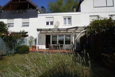 Ein Haus zum Ankommen – Reihenmittelhaus mit Garten & Garagen in Köln – Lindweiler!